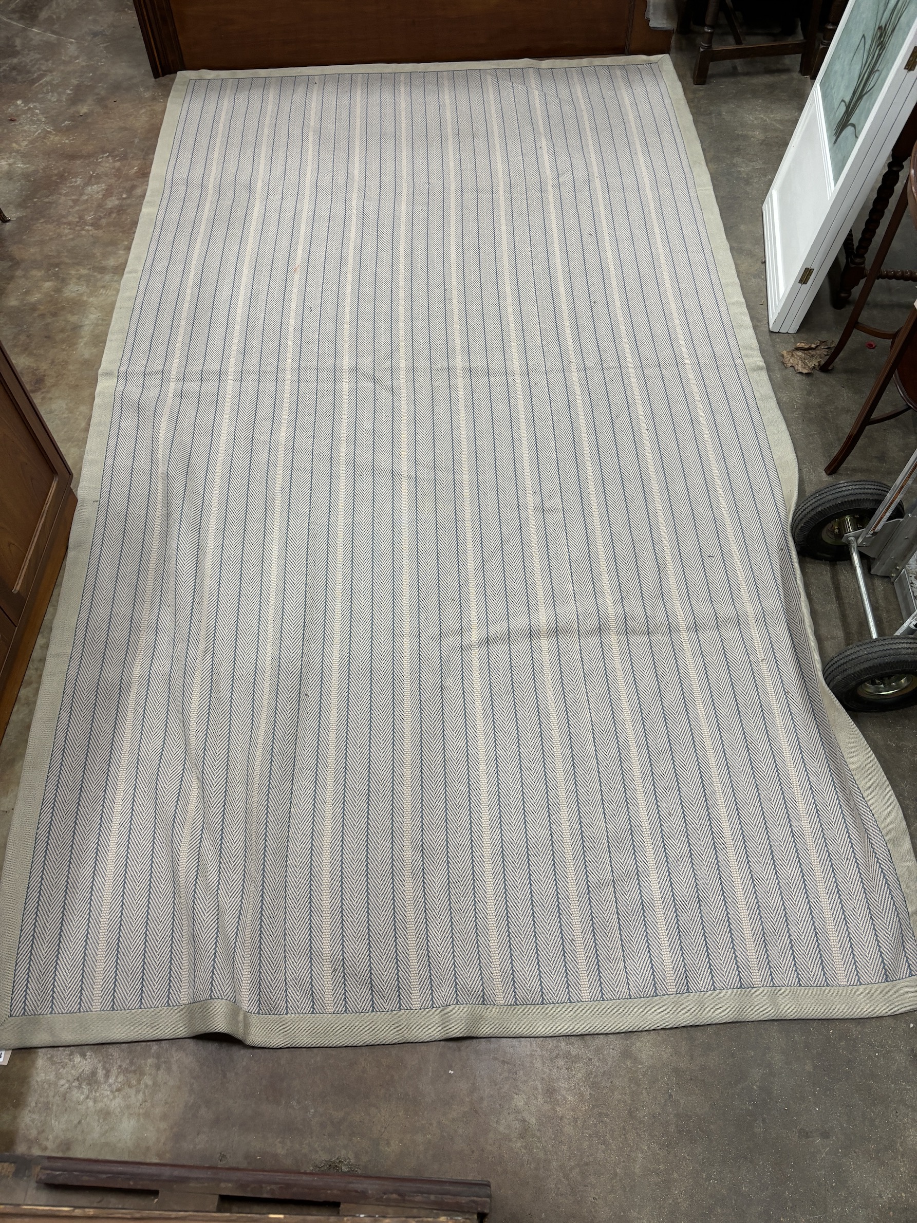 A large contemporary Roger Oats Design Herringbone pattern carpet with reversible design. 358cm x 197cm